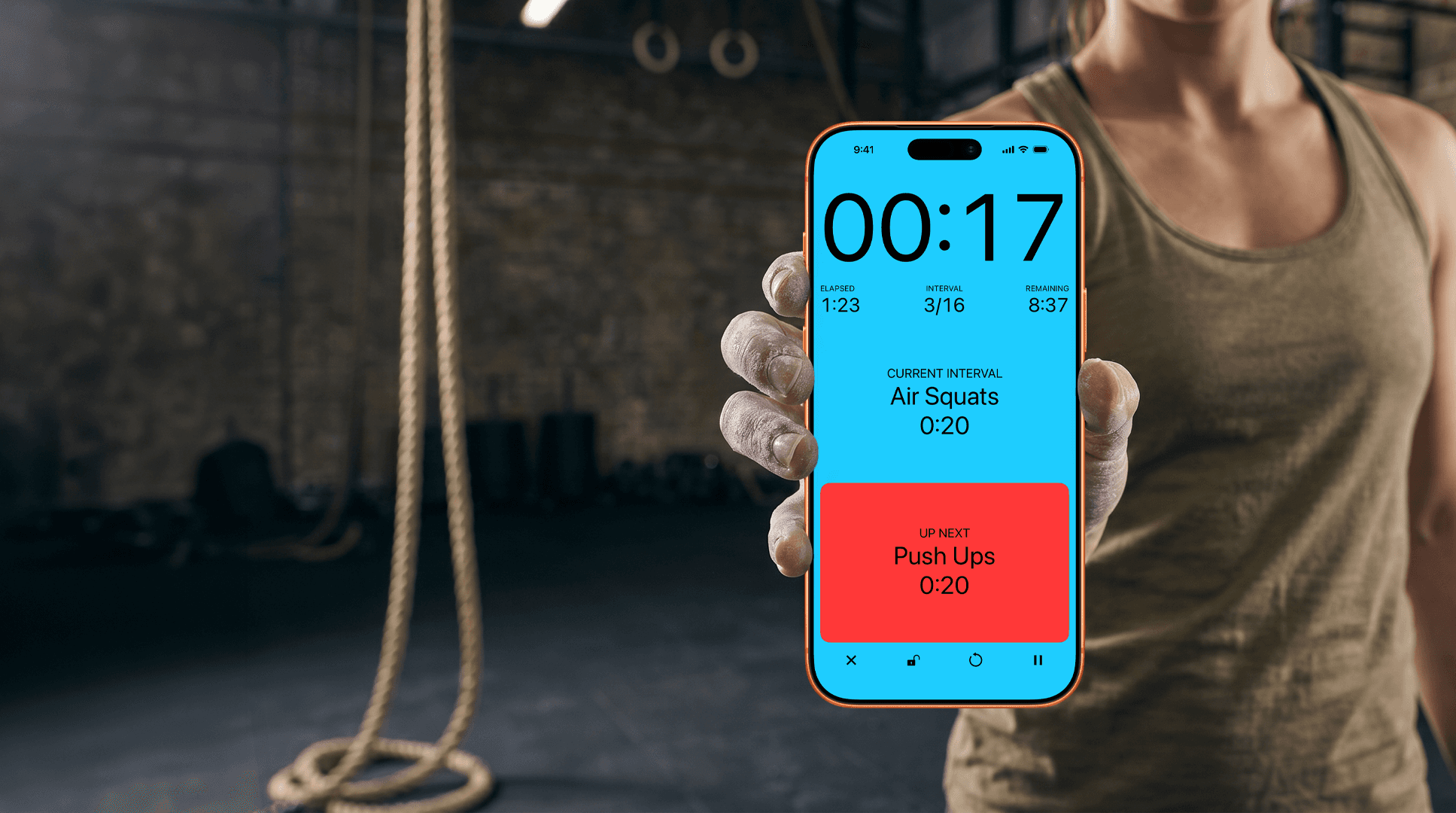 Woman holding an iPhone running Seconds Interval Timer