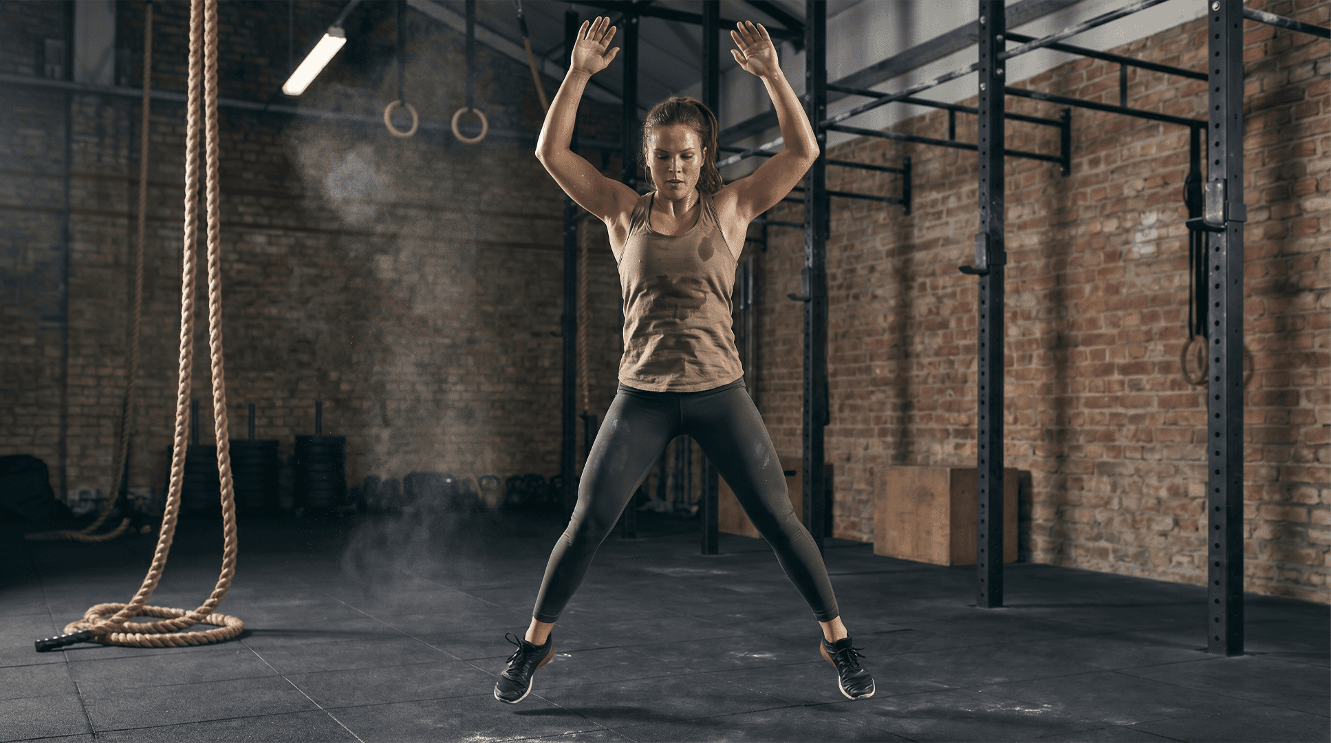 Woman performing jumping jacks