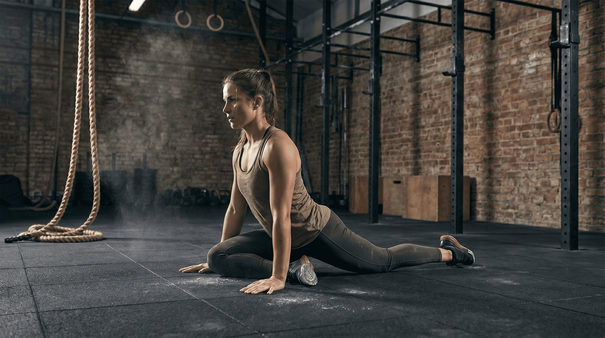 Woman performing pigeon pose