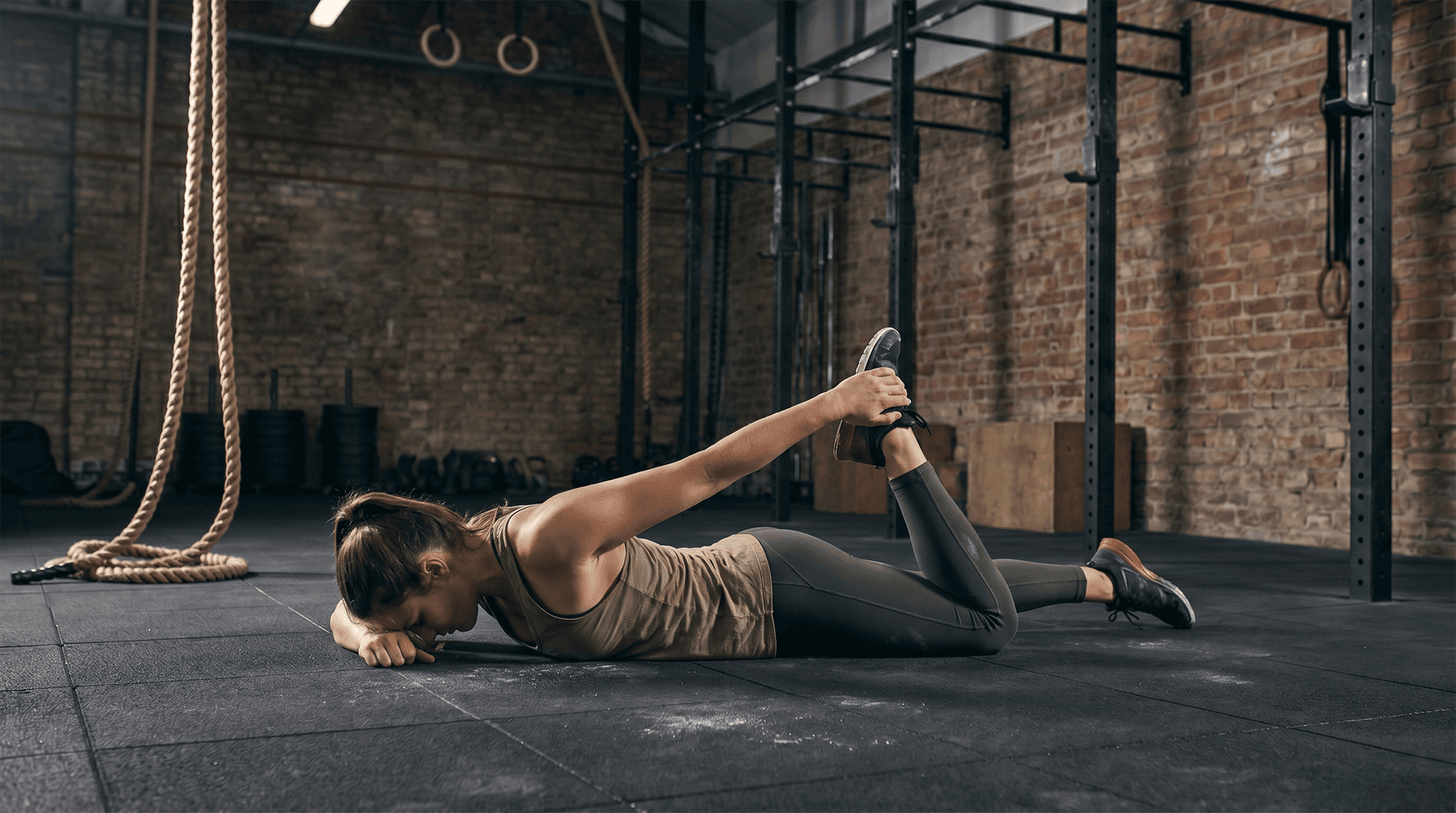 Woman performing a quad stretch