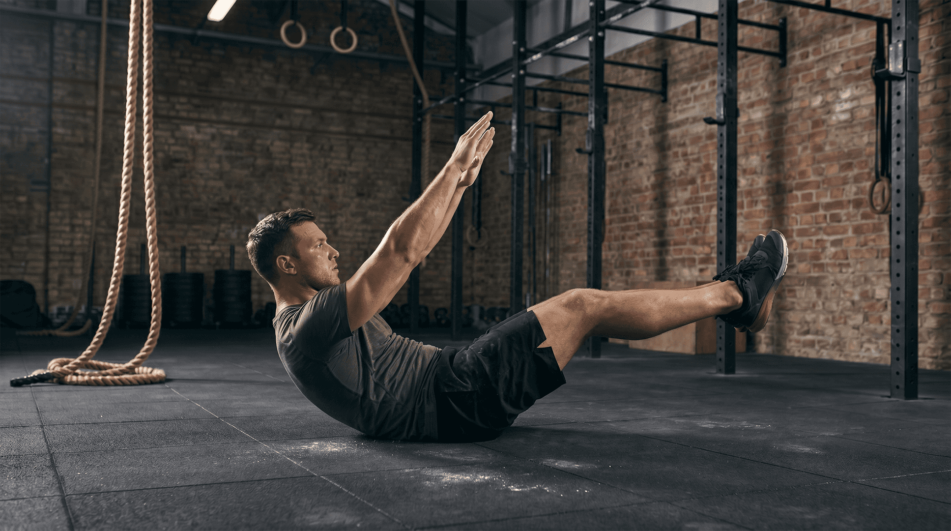 Man performing a hollow hold