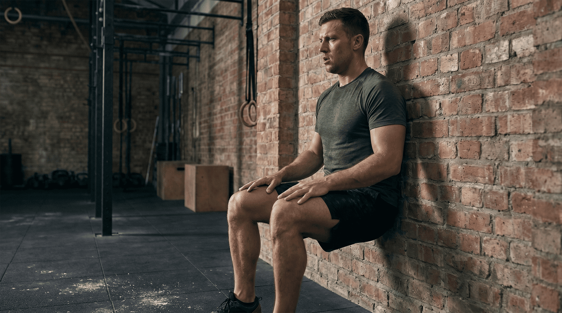 Man performing a wall sit